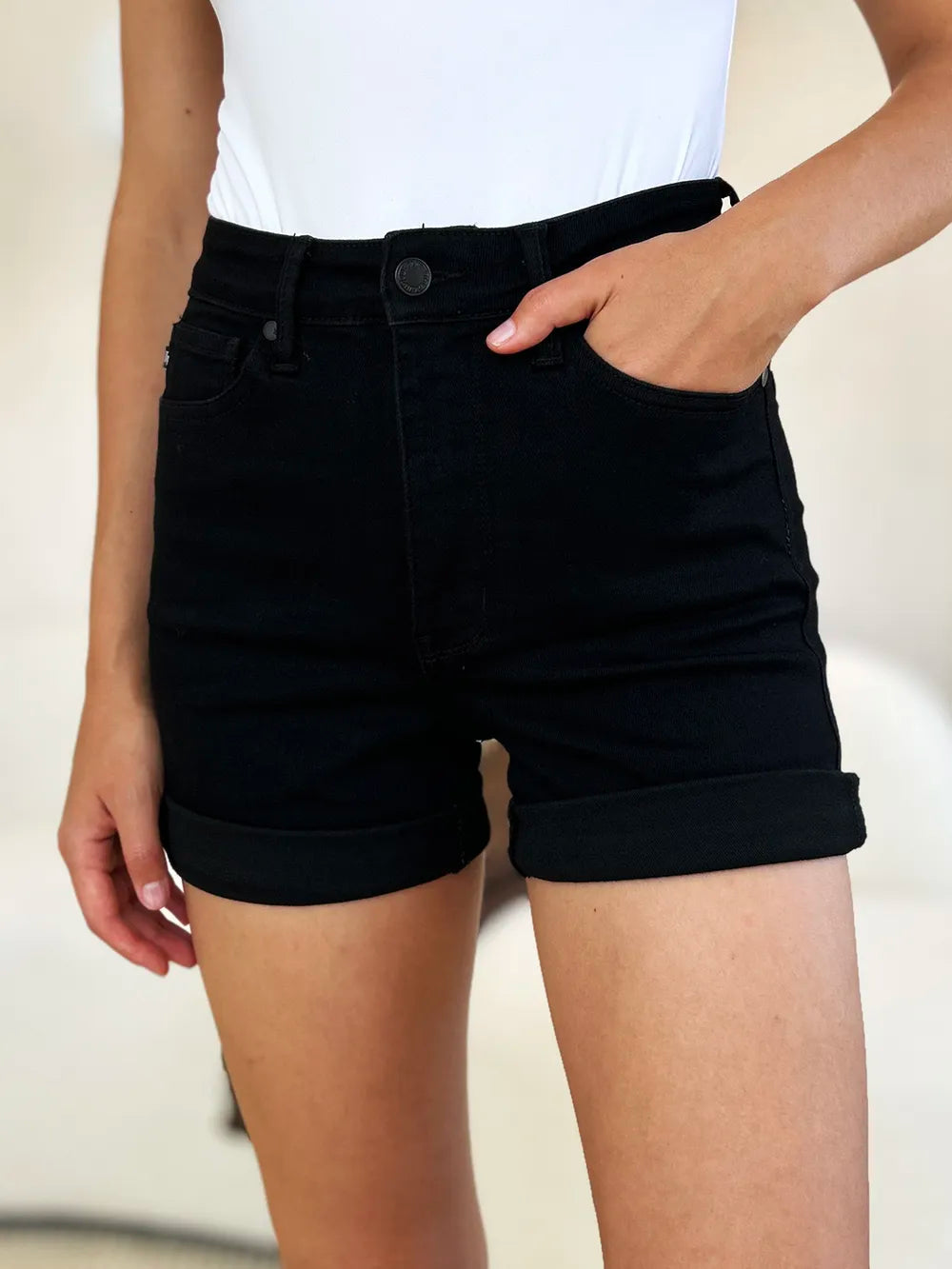 Black Judy Blue full-size high waist denim shorts with tummy control and cuffed hem, featuring a stylish and comfortable fit.