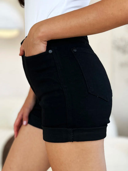 Black Judy Blue high-waist denim shorts with tummy control and cuffed hem, designed for full-size fit.