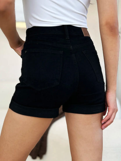 Black Judy Blue high waist denim shorts with tummy control and cuffed hem, designed for full size fit and casual style.