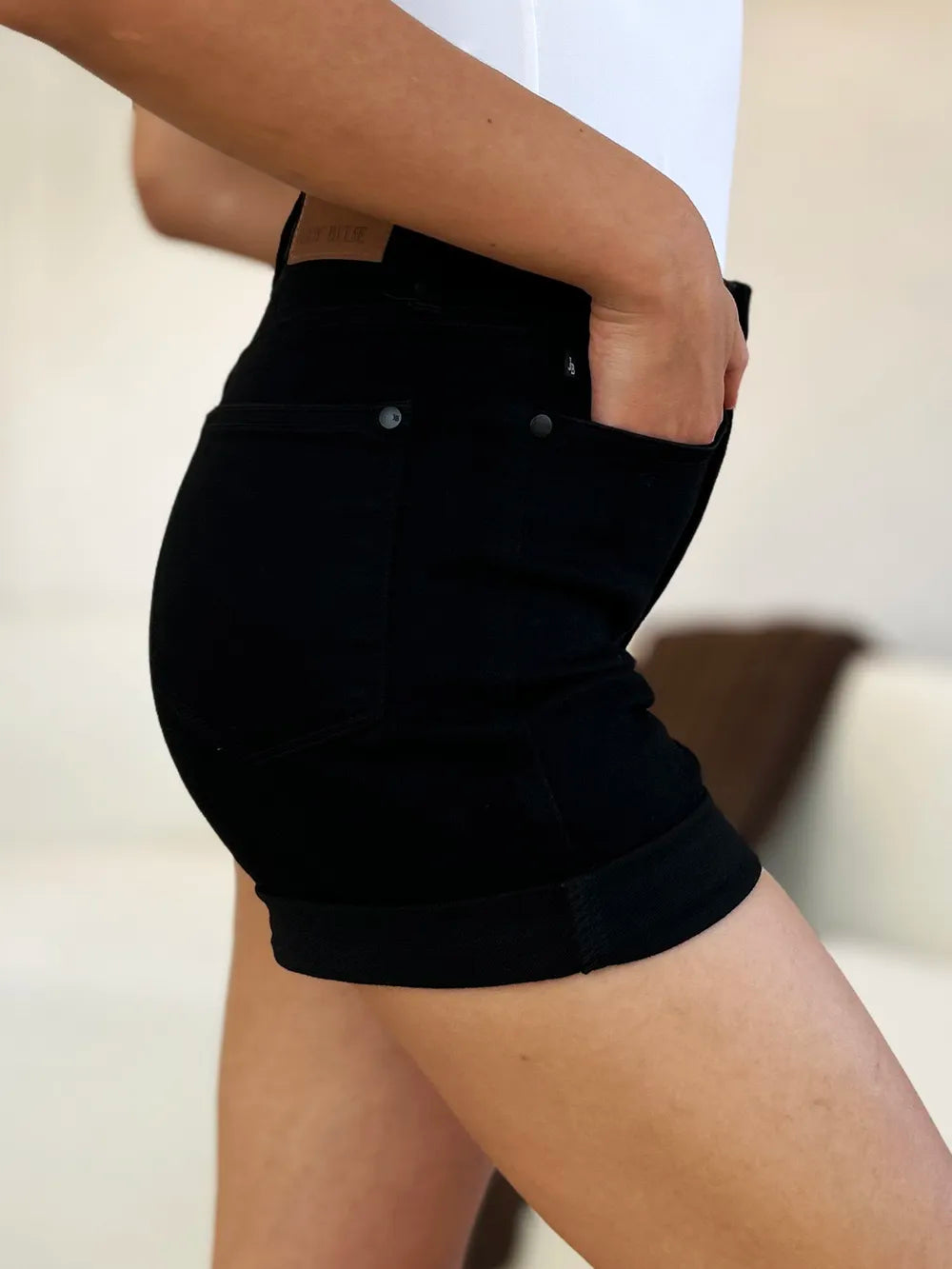 Black Judy Blue high waist tummy control cuffed denim shorts, full size, with stylish rolled cuffs and classic denim texture.