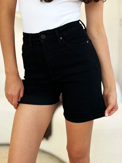 Black Judy Blue high waist denim shorts with tummy control and cuffed hem, full size, stylish and comfortable for casual wear.