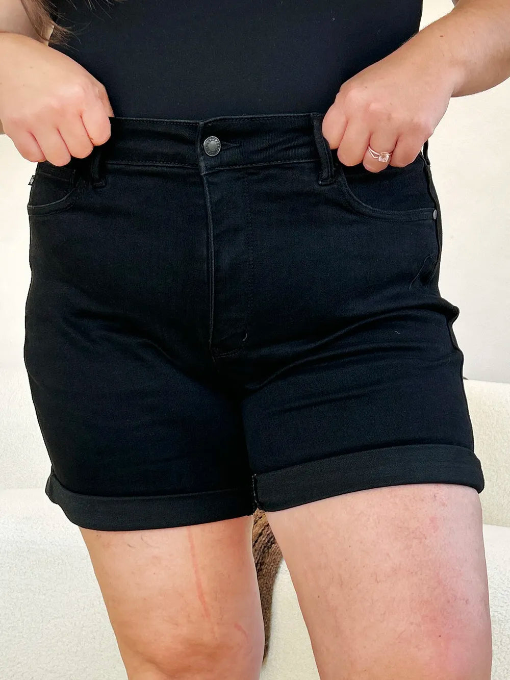 Black Judy Blue high waist cuffed denim shorts with tummy control, full size, featuring a stylish casual design.