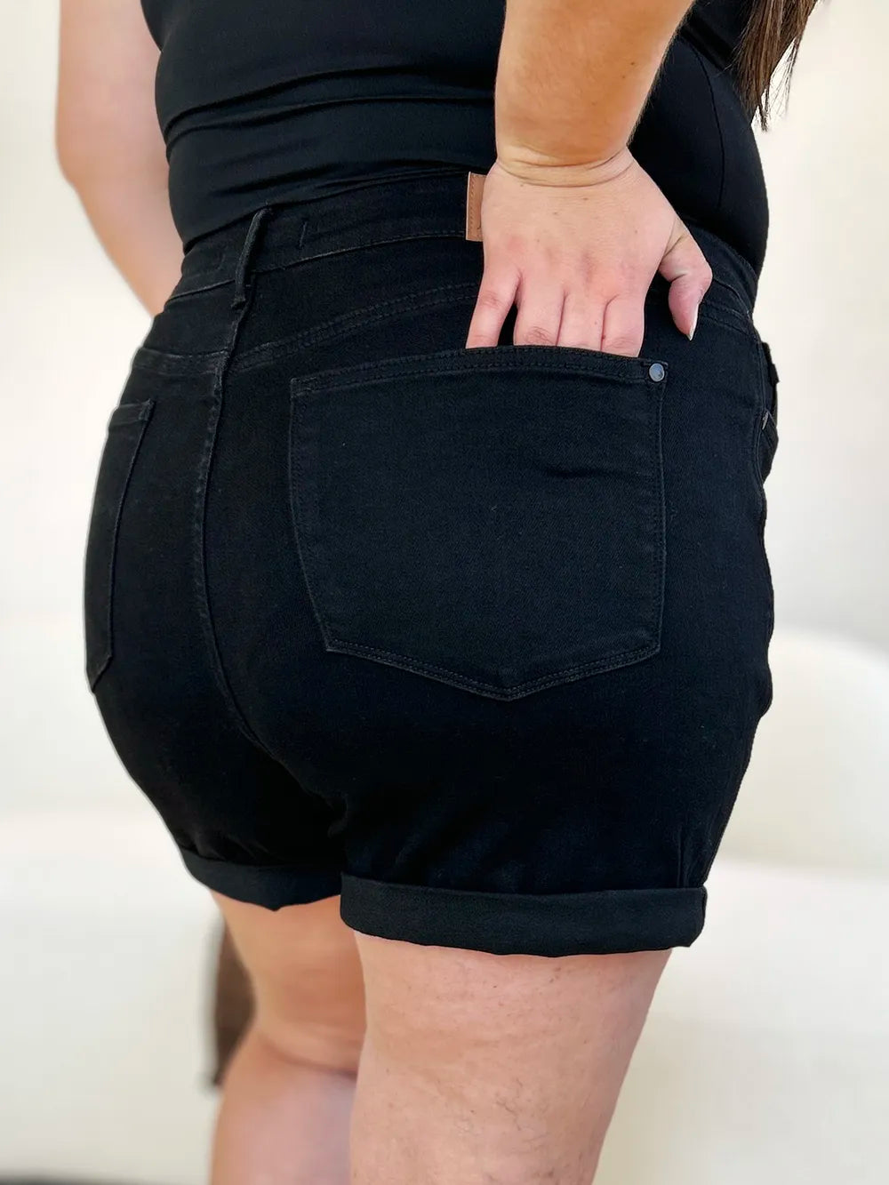 Black Judy Blue high waist denim shorts with tummy control and cuffed hem, designed for a flattering fit and stylish look.