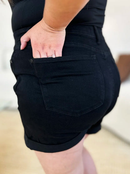 Black Judy Blue high waist denim shorts with tummy control and cuffed hem, designed for a comfortable, stylish fit.