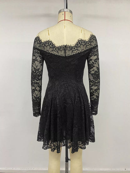 Black lace off-shoulder mini dress from Trendsi, featuring a fitted silhouette and delicate lace details.