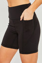 Black Love Tree high waist active shorts with seam detail, designed for comfort and style during workouts or casual wear.