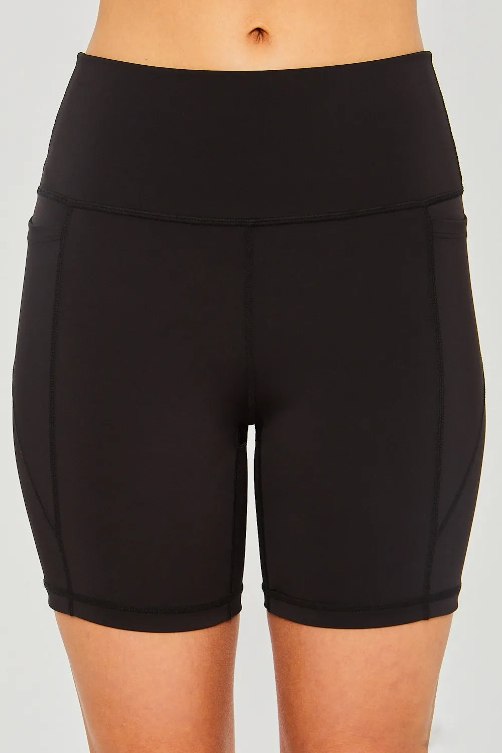 Black Love Tree high waist active shorts with seam detail from Trendsi, designed for workout and casual wear.