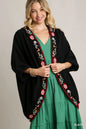 Black Umgee embroidery open front kimono with pleated shoulder detail, featuring intricate embroidery and flowing fabric.