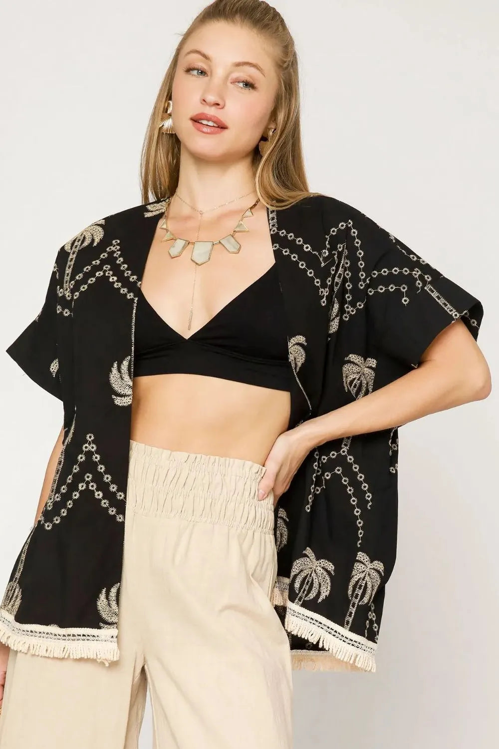 Black open front embroidered fringe kimono by Umgee featuring intricate embroidery and flowing fringe details.