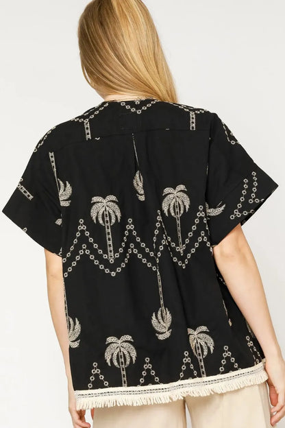 Black Umgee open front embroidered fringe kimono with intricate embroidery and flowing fringe details.