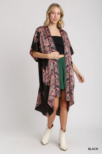 Black Umgee satin border print kimono with short sleeves, open front design, featuring a stylish and lightweight open-front kimono.