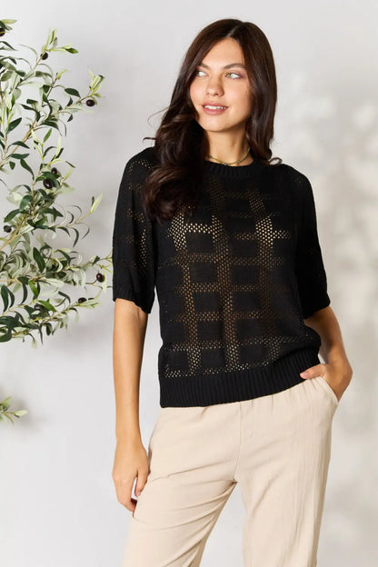 Black Mandy ribbed trim round neck knit top from Trendsi, featuring a fitted silhouette and soft, stretchy fabric.