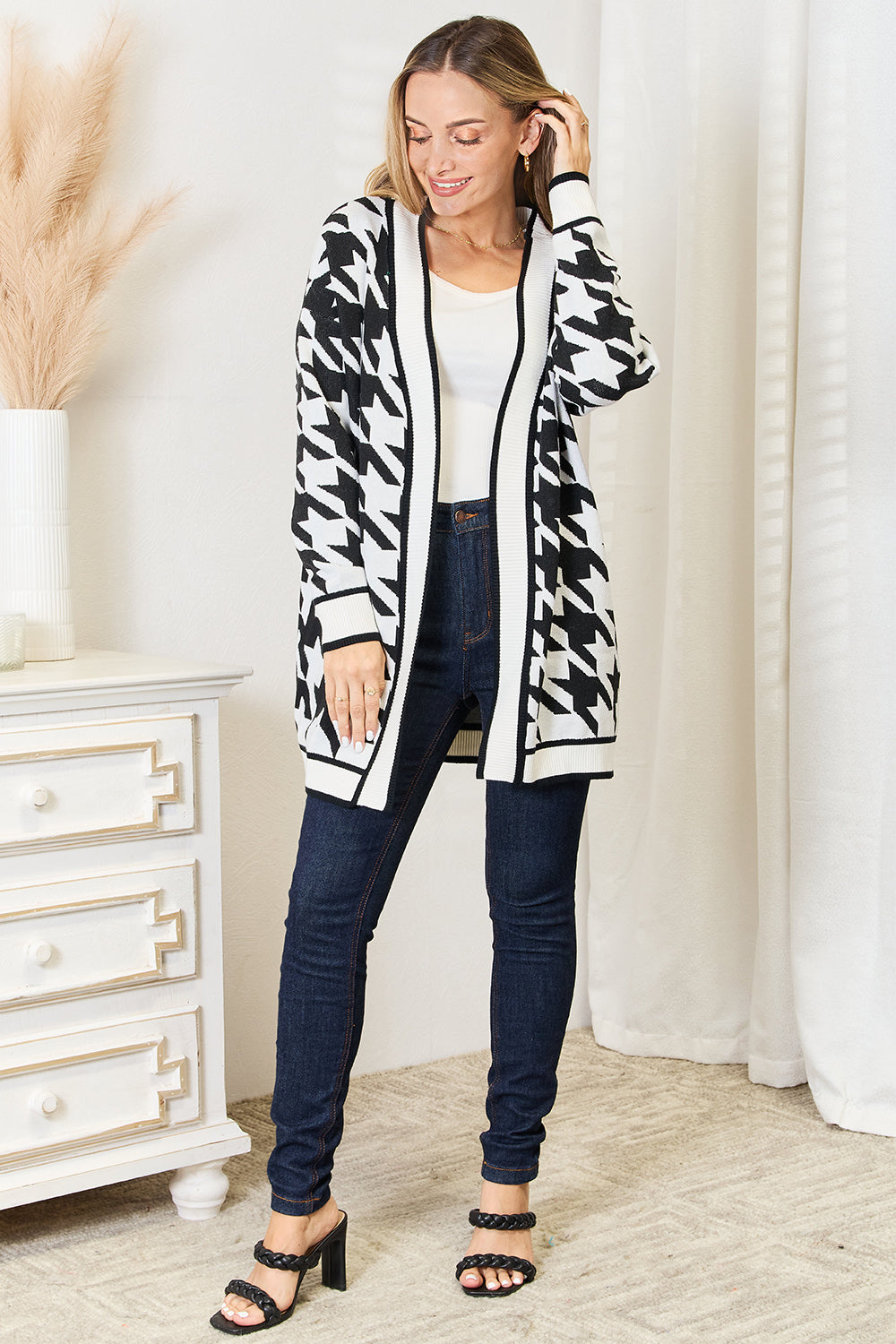 Black Mandy woven houndstooth open front longline cardigan by Trendsi, featuring a stylish woven pattern and relaxed fit.