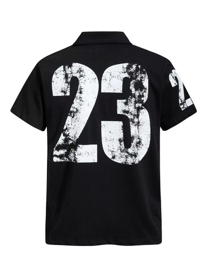 Men's black classic embroidered short sleeve polo shirt by Trendsi, featuring a collared design and embroidered details.
