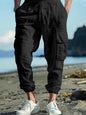 Men's full-size casual cargo pants with drawstring waist in black, plus size, by Trendsi, shown on a model.