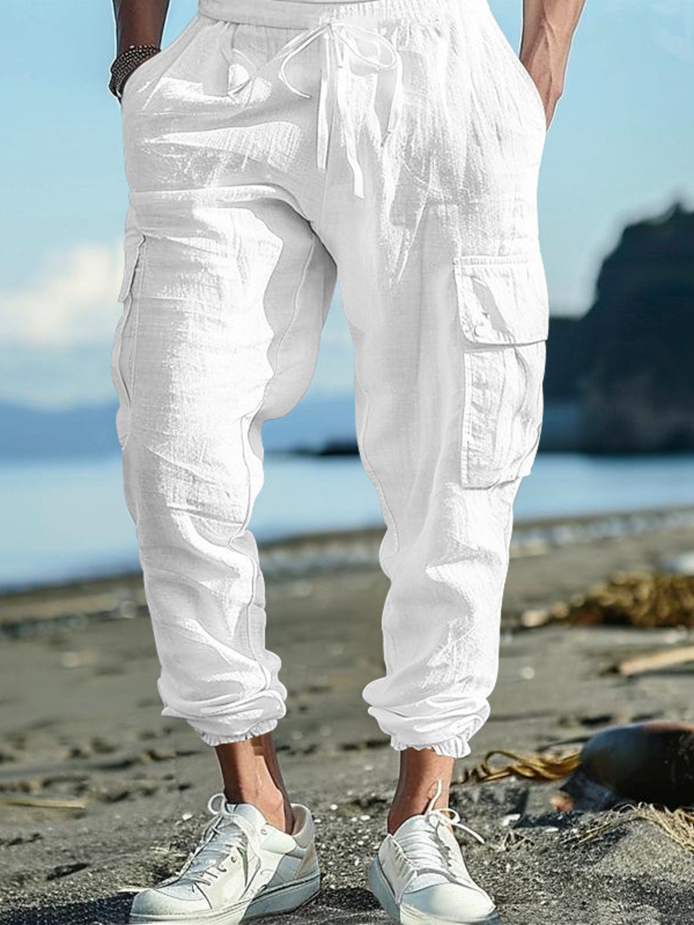 Men's full-size casual cargo pants by Trendsi in black with drawstring waist, plus size, relaxed fit and comfortable style.