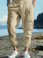 Men's full-size casual cargo pants with drawstring waist in black, plus size, from Trendsi, shown on a model.