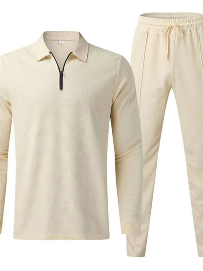 Plus size men's black long sleeve top and pants set by Trendsi, casual full-length loungewear outfit on a model.