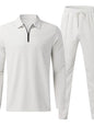 Plus size men's black long sleeve top and pants set by Trendsi, featuring a comfortable fit and casual style.