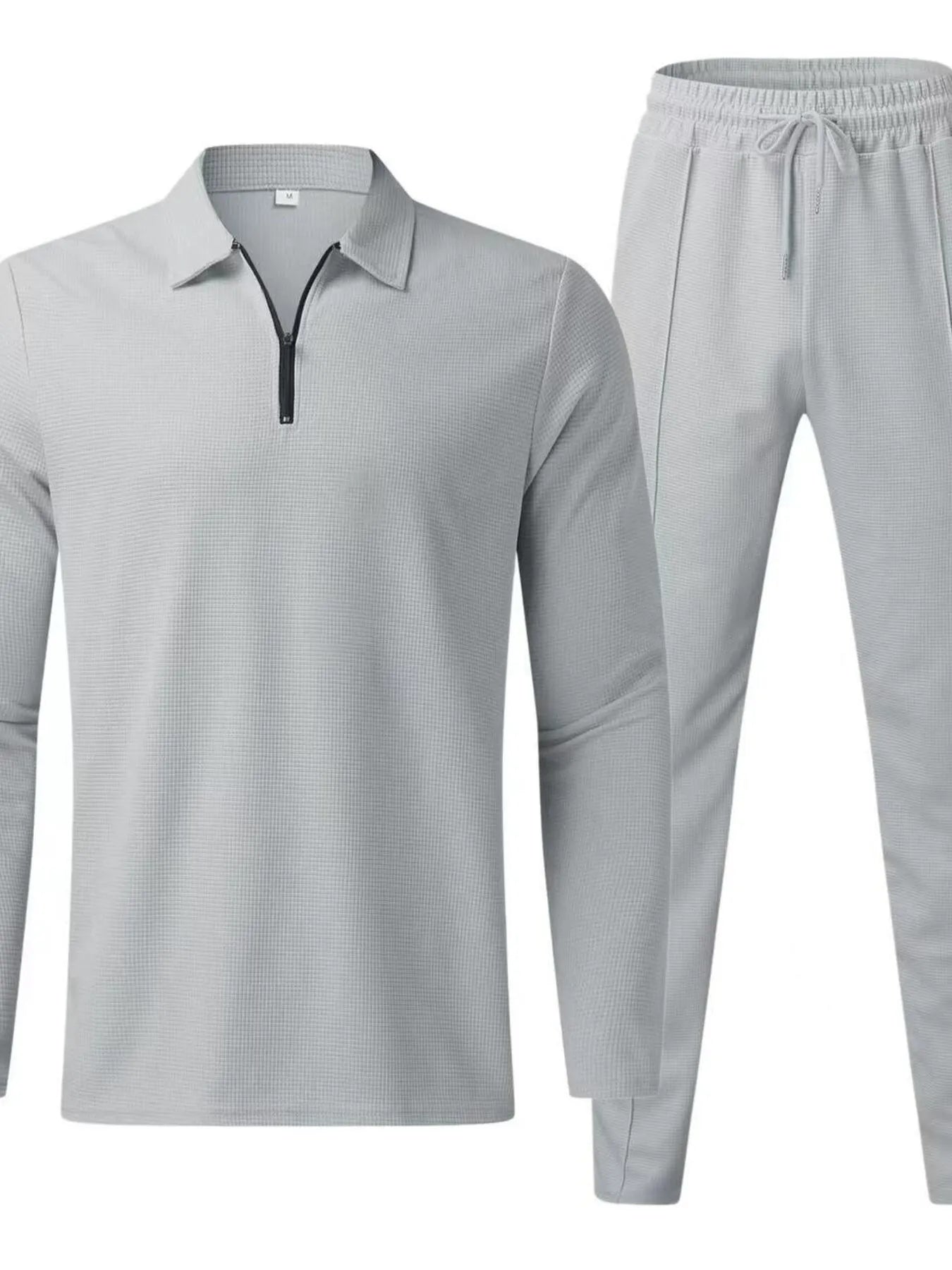 Plus size men's long sleeve top and pants set by Trendsi in black, casual loungewear or sleepwear ensemble.