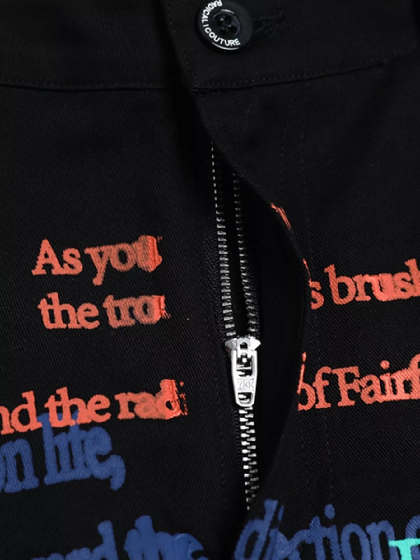 Men's printed cargo pants in black from Trendsi, featuring multiple pockets and a relaxed fit, suitable for casual wear.