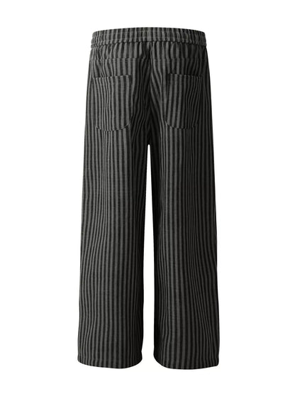 Men's black striped casual drawstring pants by Trendsi, featuring a relaxed fit and comfortable waistband.