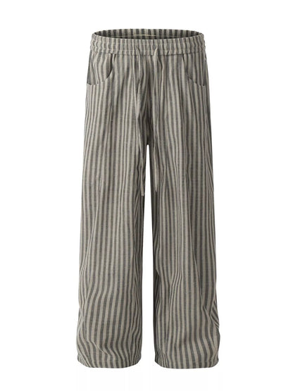 Men's black striped casual drawstring pants by Trendsi, featuring a relaxed fit and comfortable waistband, shown on a model.
