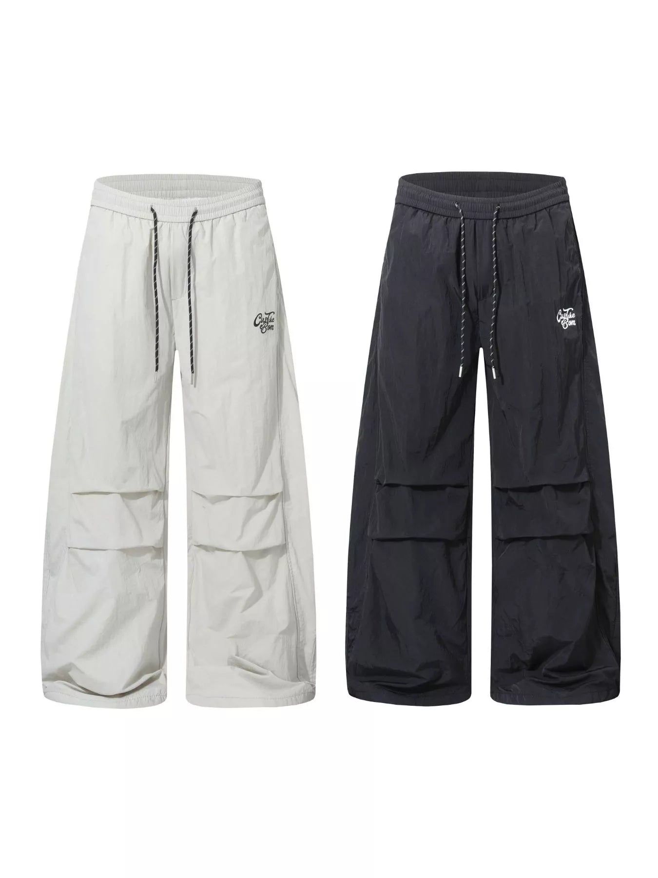 Men's black wide-leg cargo pants from Trendsi, featuring multiple pockets and relaxed fit, styled on a model.
