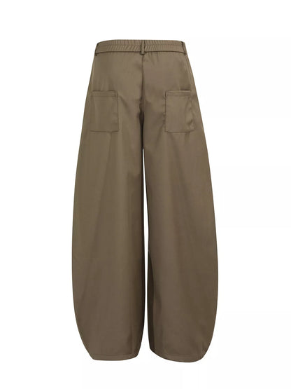 Men's black wide leg pants with pleated front by Trendsi, featuring a relaxed fit and stylish design.