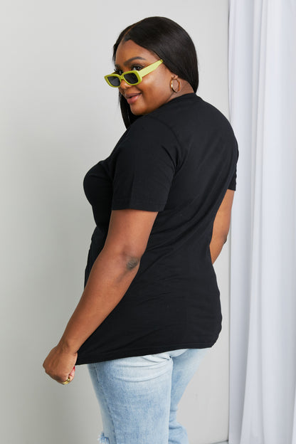Black mineB full-size butterfly graphic T-shirt by Trendsi, featuring a bold butterfly design on the front.