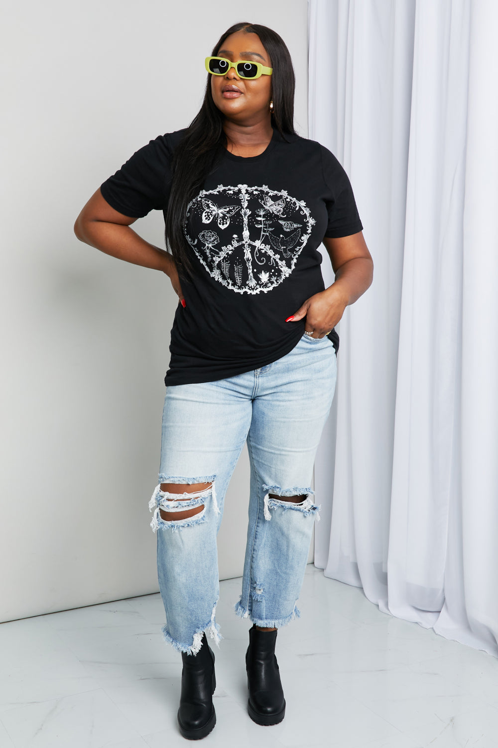 Black mineB butterfly graphic tee shirt by Trendsi featuring a full-size butterfly print on soft cotton fabric.