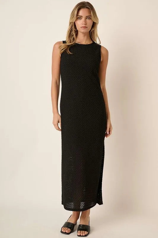 Black Mittoshop sleeveless dress with side slit and round neckline, stylish Trendsi fashion for casual or summer wear.