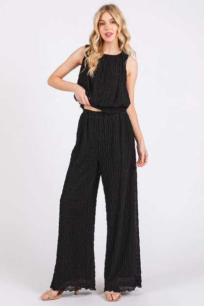 Black textured stretchy crop tank and pants set by Mittoshop, stylish and comfortable lounge or casual wear from Trendsi.