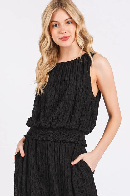 Black Mittoshop textured stretchy crop tank and pants set by Trendsi, featuring a fitted, comfortable matching two-piece outfit.