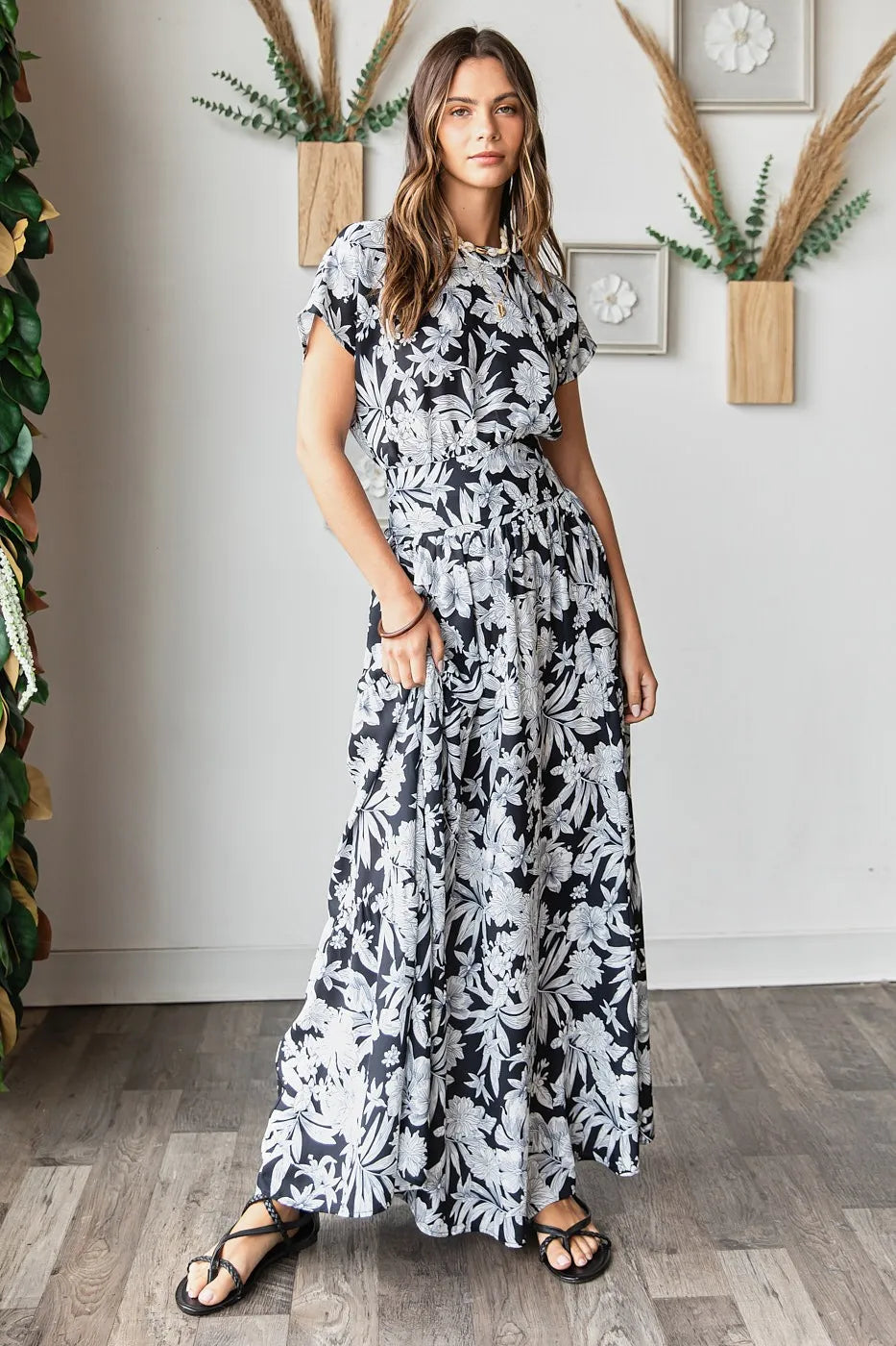 Black tropical print top and skirt set from Mittoshop by Trendsi, featuring vibrant botanical patterns and casual summer style.
