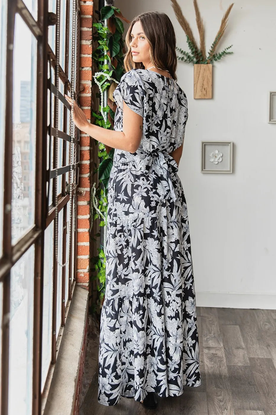 Black tropical print top and skirt set by Trendsi, stylish women's outfit with vibrant floral pattern and matching design.
