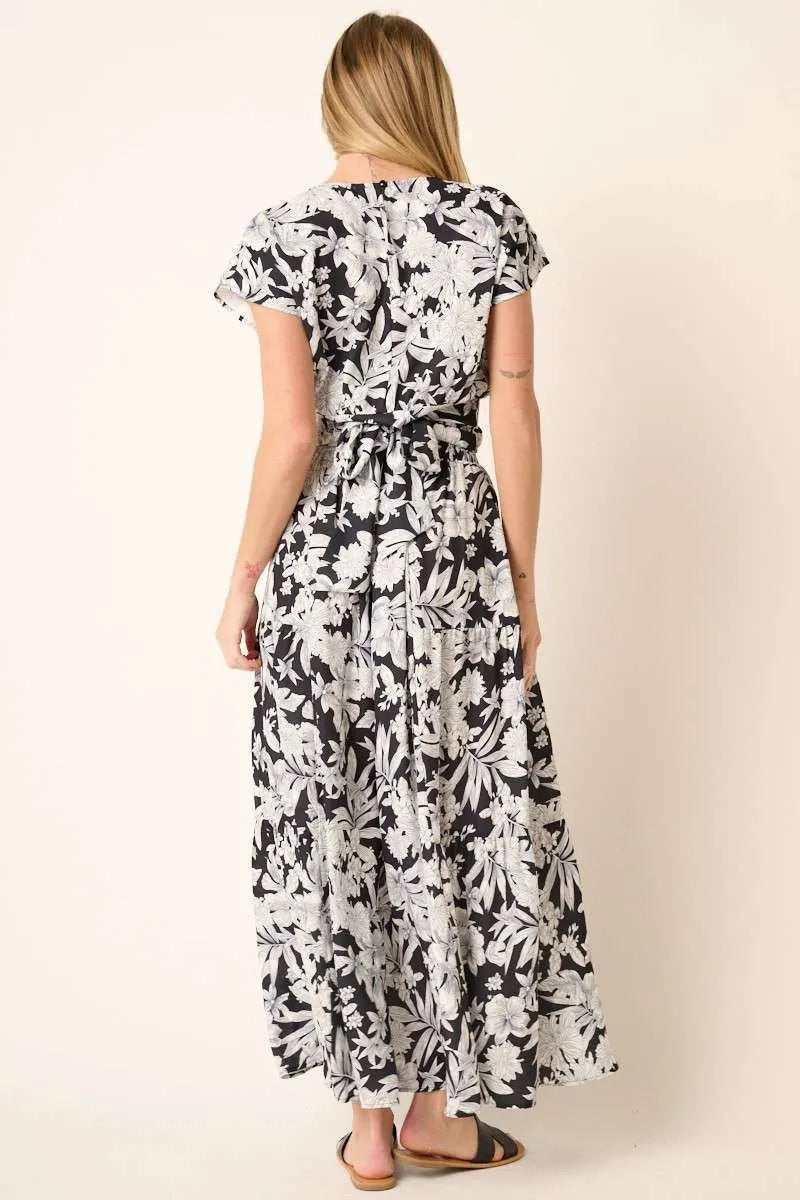 Black tropical print top and skirt set by Mittoshop, featuring vibrant floral patterns and casual summer style.