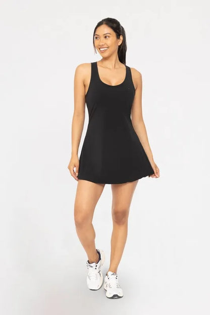 Black MONO B adjustable active A-line dress from Trendsi, featuring a fitted bodice and flowy skirt, perfect for active or casual wear.