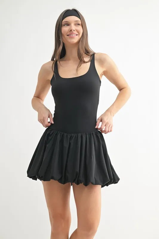 Black MONO B Bubble Active mini dress by Trendsi, featuring a fitted silhouette and stylish design, shown on a model.