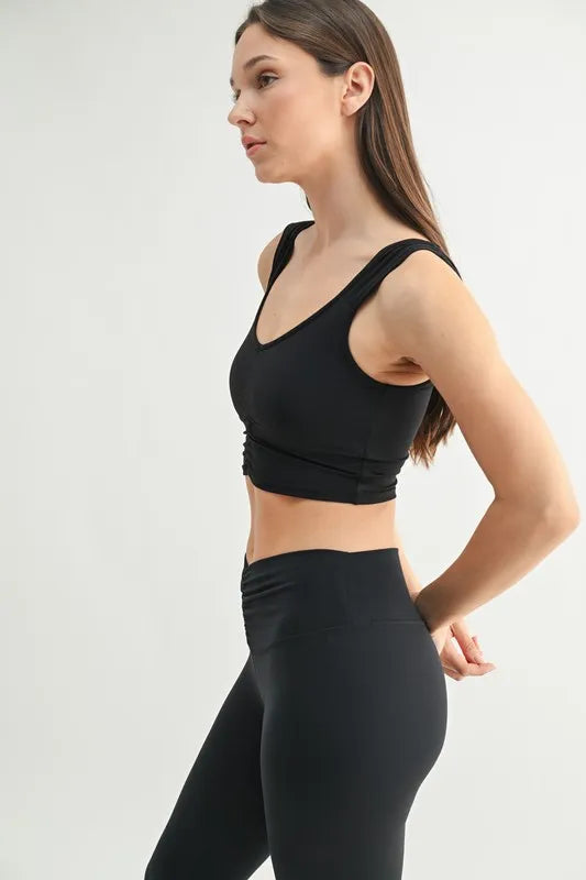 Black Mono B ruched front active tank top with adjustable straps, designed for workout and casual wear.
