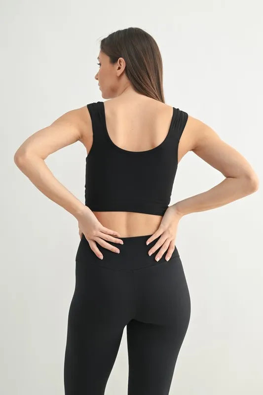 Black MONO B ruched front active tank top, fitted athletic wear for women, shown on a model.