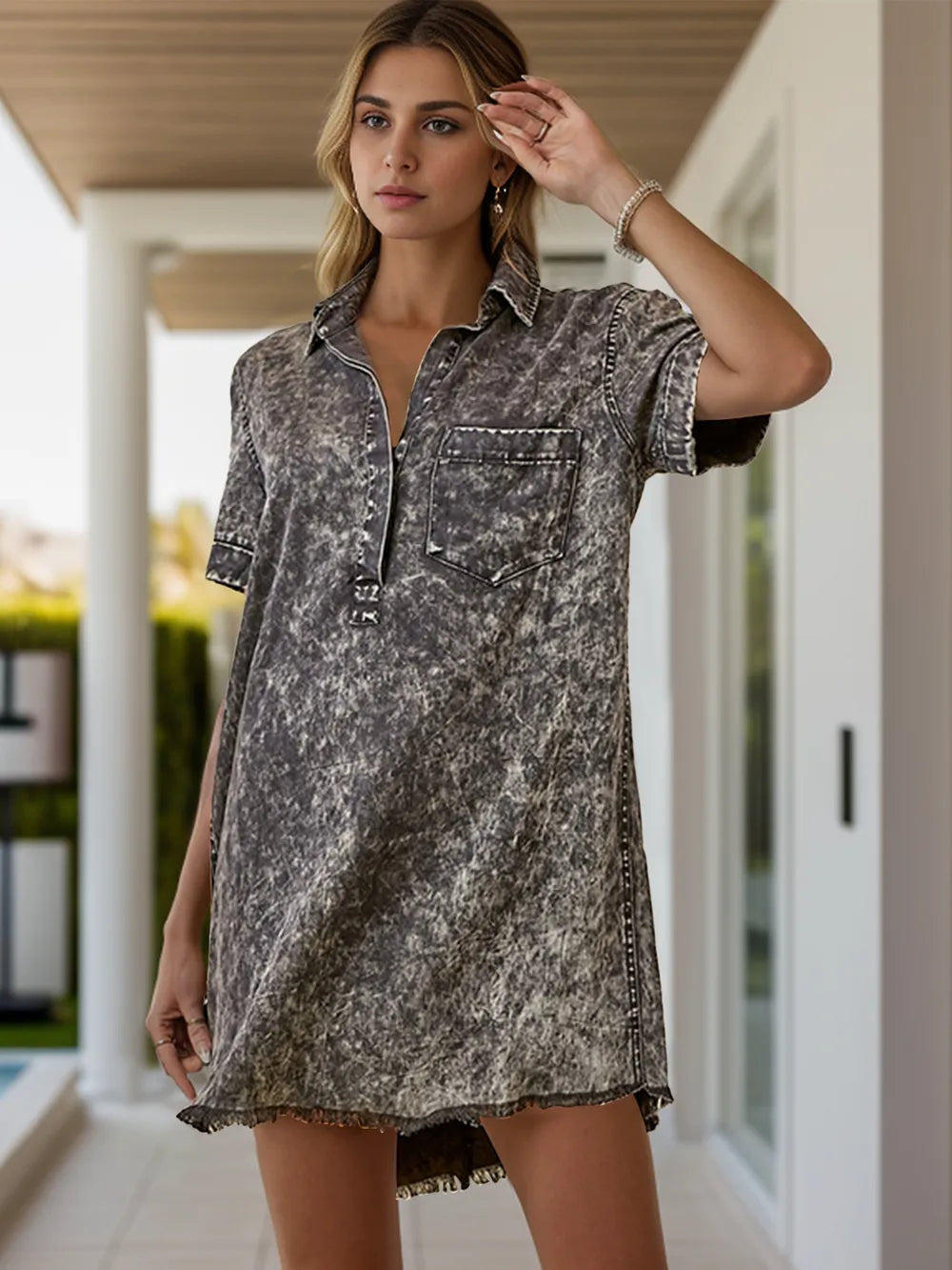 Black denim dress with collar, short sleeves, and front pockets, featuring a stylish and casual design by Trendsi.
