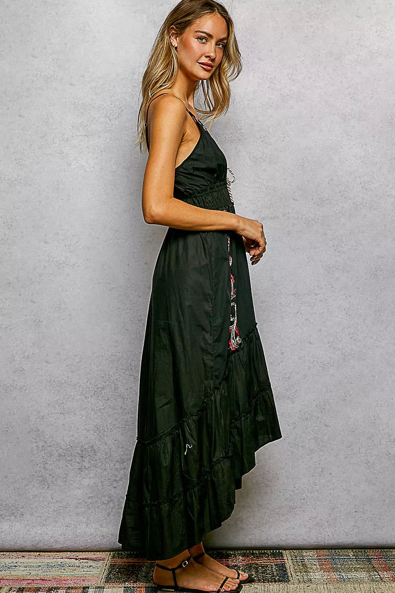 Black POL embroidered tassel tie smocked waist midi tiered cami dress by Trendsi, featuring embroidered details and tassel accents.