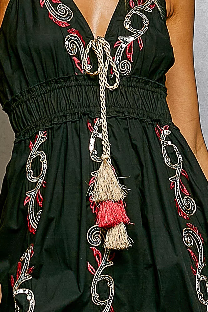 Black POL embroidered detail tassel tie smocked waist midi tiered cami dress with adjustable straps and intricate embroidery by Trendsi.