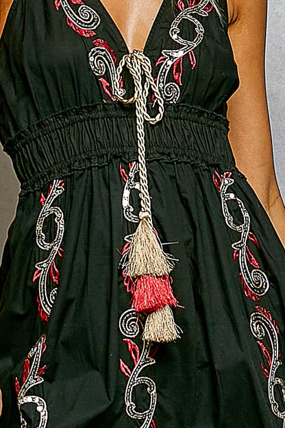 Black POL embroidered detail tassel tie smocked waist midi tiered cami dress with adjustable straps and intricate embroidery by Trendsi.