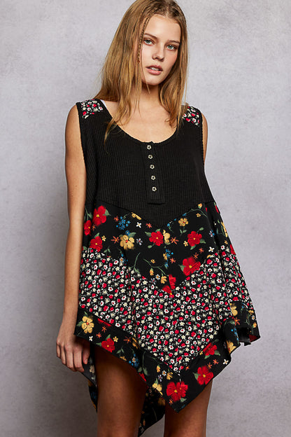 Black POL round neck ribbed tank top with woven print patch from Trendsi, featuring a fitted design and stylish patch detail.