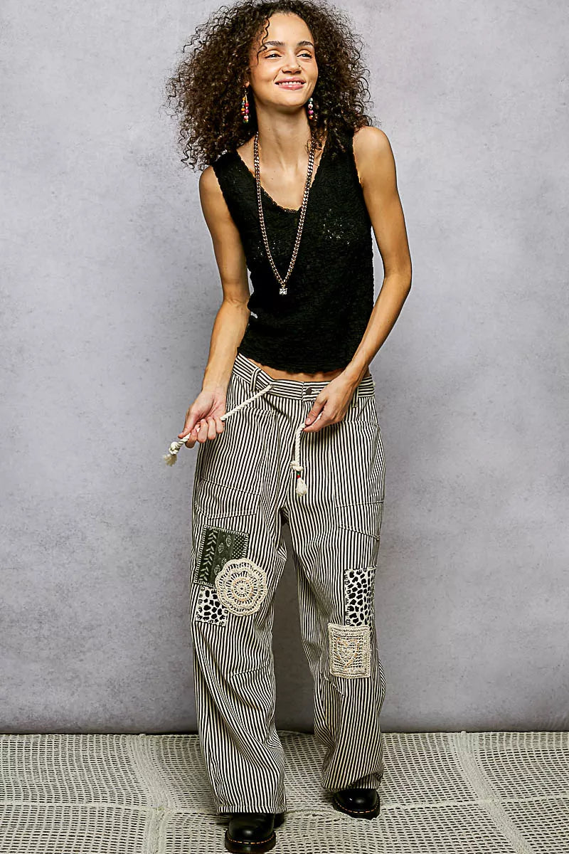 Black POL textured knit V-neck tank top with lace trim, stylish and comfortable women's sleeveless knit blouse.