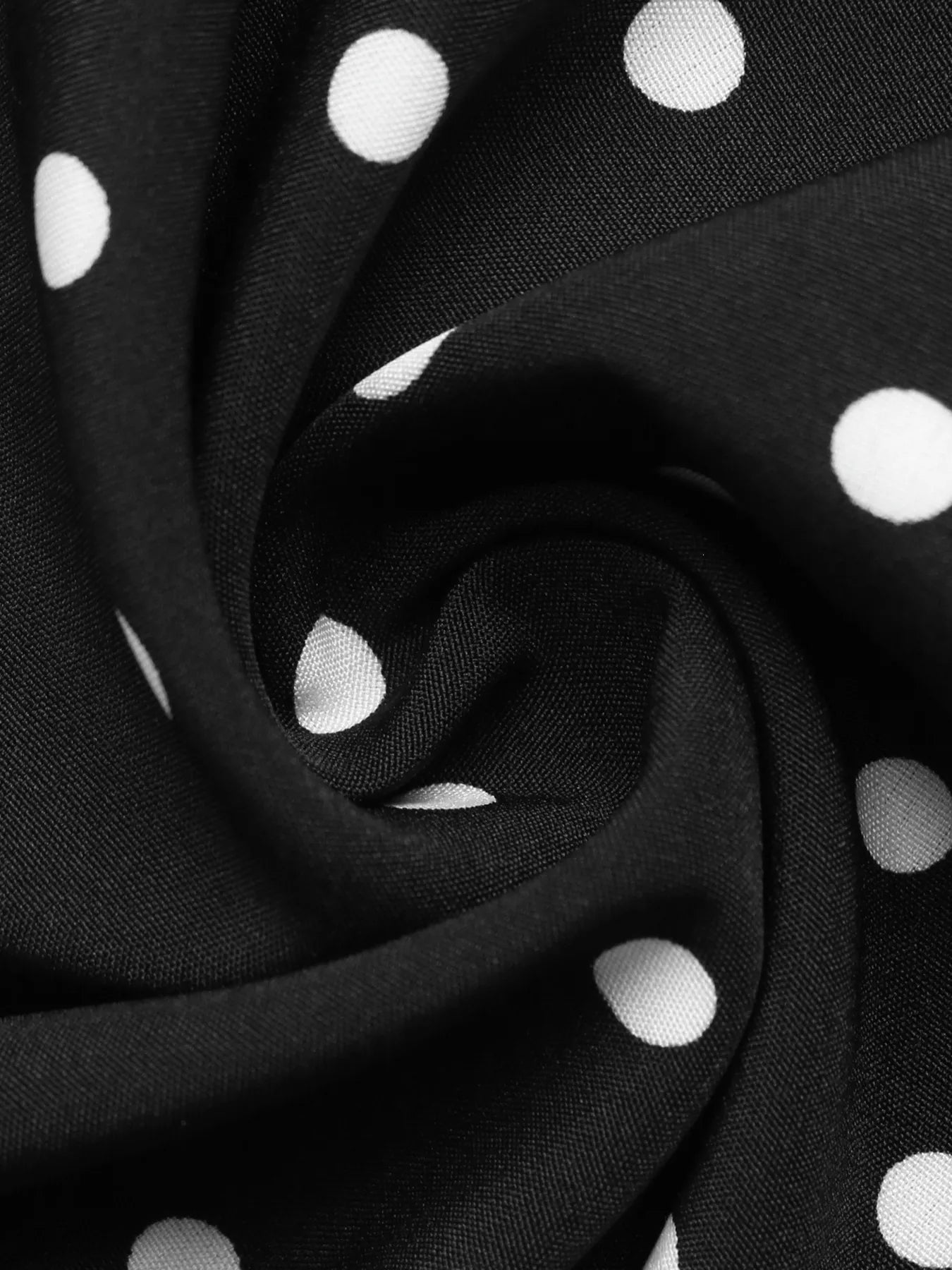Black polka dot Peter Pan collar dress by Trendsi, featuring a classic silhouette with a contrasting collar and playful pattern.