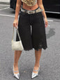 Black raw hem distressed denim shorts by Trendsi, featuring frayed edges and a casual fit, perfect for summer casual wear.