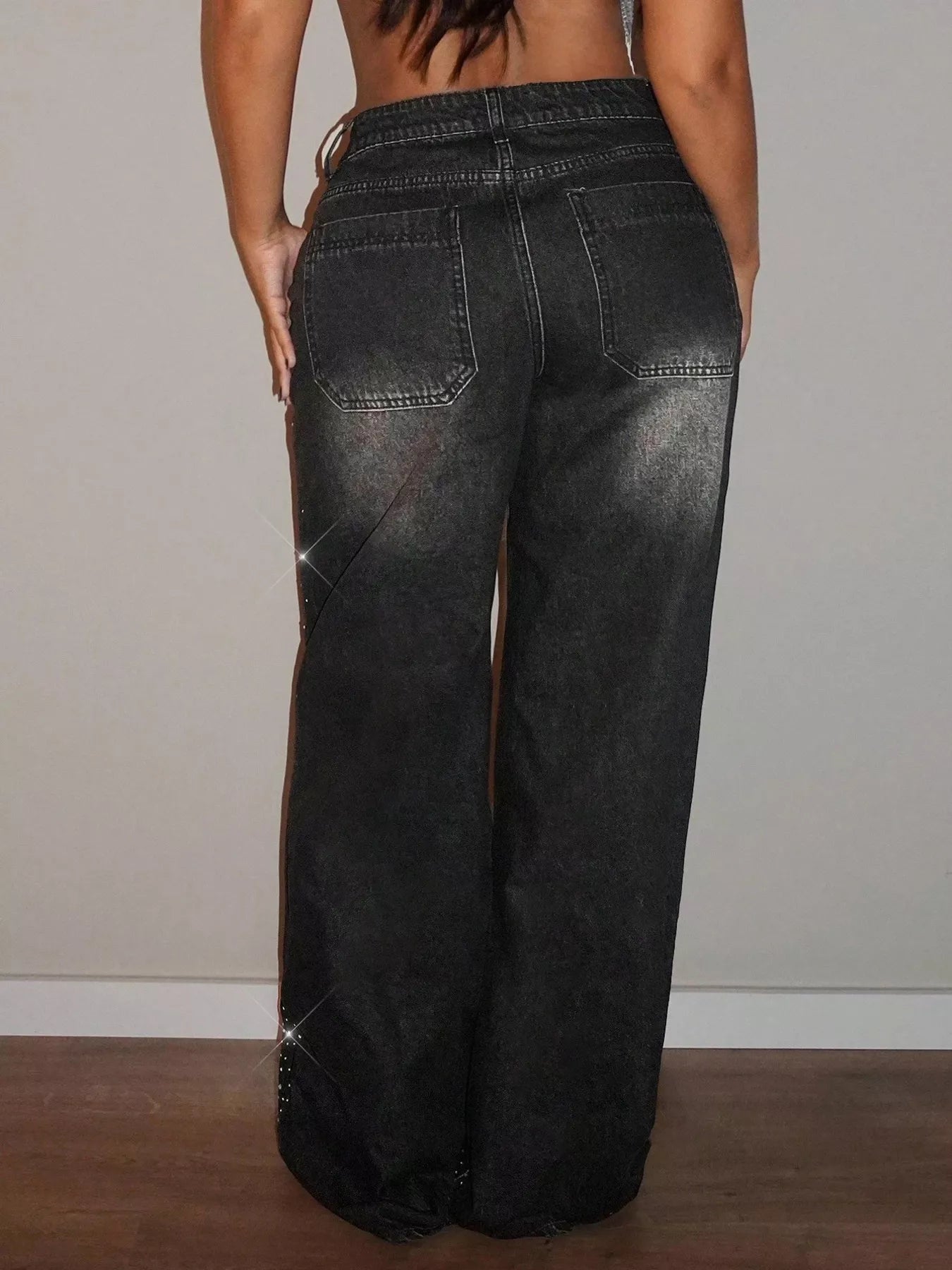 Black rhinestone wide-leg jeans from Trendsi featuring sparkling rhinestone details and a relaxed, wide-leg fit.